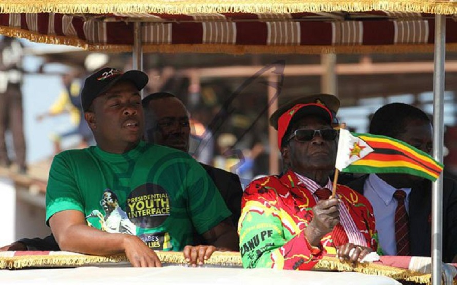 President Mugabe arrives at Pelandaba Stadium accompanied by Cde Kudzayi Chipanga