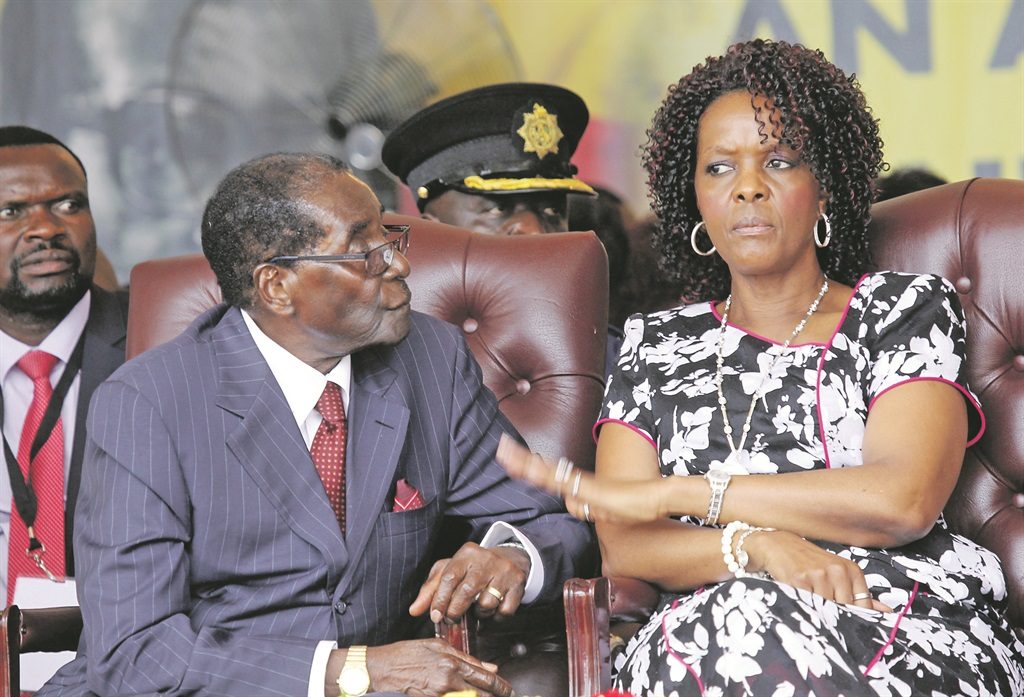 President Robert Mugabe sits with his wife, Grace PHOTO- AP