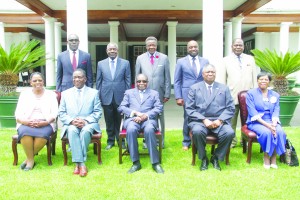 President Robert Mugabe flanked by his deputies Emmerson Mnangagwa, left, Phelekezela Mphoko right, and new ministers Chiratidzo Mabuwa of Youth Development, Indigenisation & Economic Employment seated far left, Thokozile Mathuthu Minister of State for Matabeleland North Province seated far right, standing from left Edgar Mbwembwe Tourism, Environment and Hospitality Industry, Happyton Bonyongwe Justice, Legal and Parliamentary Affairs, Webster Shamu Minister of State for Mashonaland West, Paul Chimedza Minister of State for Masvingo and Misheck Sibanda Chief Secretary to the President and Cabinet pose for a group picture after the swearing ceremony at State House in Harare on Tuesday. Picture by Freedom Mashava