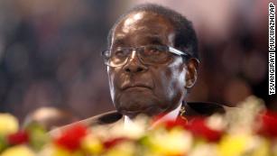 Mugabe supporters mull his fate: 'It's as if their father has died'