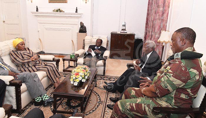President Mugabe meets ZDF Commander and SA envoys at State House