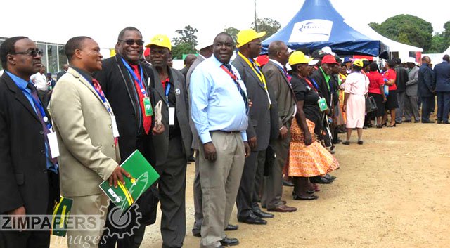 Delegates wait for the arrival of President Mnangagwa