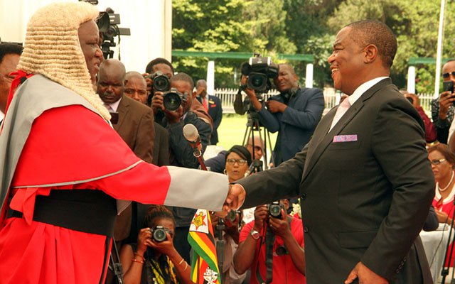 Chief Justice Luke Malaba swears in Vice President General Constantino Guvheya Nyikadzino Chiwenga at State House in Harare yesterday.-(Picture by Tawanda Mudimu)
