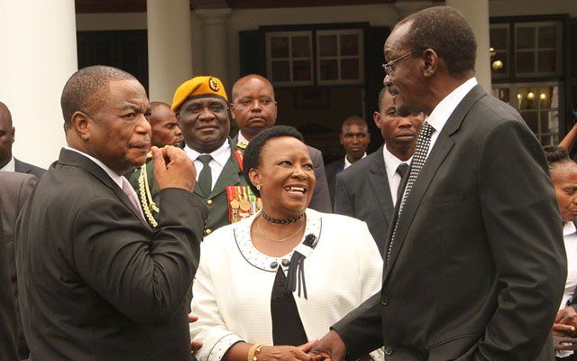 Vice Presidents General Constantino Chiwenga (Retired) (left) and Kembo Mohadi chat with First Lady Auxillia Mnangagwa after their swearing-in ceremony at State House in Harare yesterday