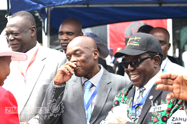 Cde Oppah Muchinguri-Kashiri shares a joke with ZRP Commissioner-General Augustine Chihuri while Cdes Shiri and Khaya Moyo look on