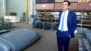 Quest-Director-Tarik-Adam-shows-some-of-the-vehicles-kits-that-have-arrived-at-the-Mutare-plant