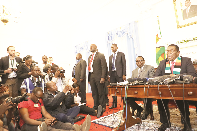 President Mnangagwa flanked by Acting Information, Media and Broadcasting Services Minister Ambassador Simon Khaya Moyo addresses 