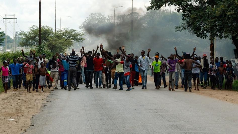 Protesters block the main route to Zimbabwe's capital, Harare, from Epworth township on January 14 2019 after a hike in fuel prices was announced. © 2019 JEKESAI NJIKIZANA/AFP/Getty Images