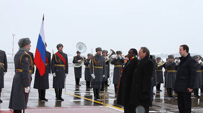 UPDATED: President arrives in Russia, meets Putin