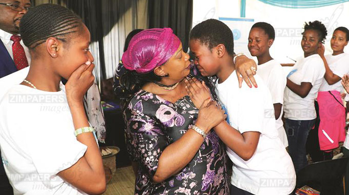 First Lady rolls out 100 scholarships