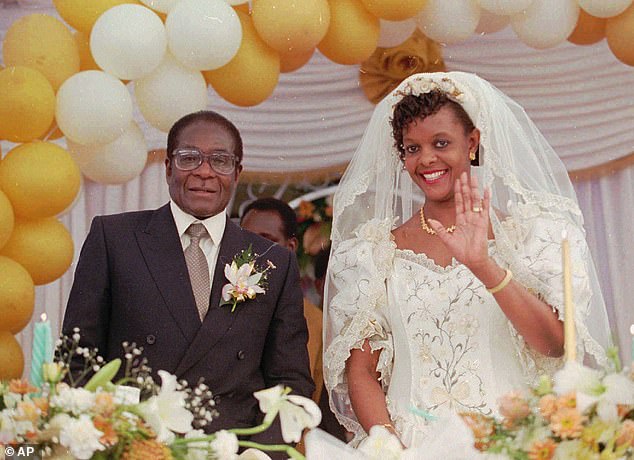 Mugabe and Grace wave at guests after their wedding ceremony at Kutama in August 1996