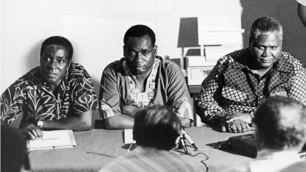 Robert Mugabe,(l) The Deputy Of The African National Congress (Anc) Georges Silundika And The Leader Of The Zapu Party (Zimbabwe African People Union) Joshua Nkomo At A Meeting In Dar Es Salaam,