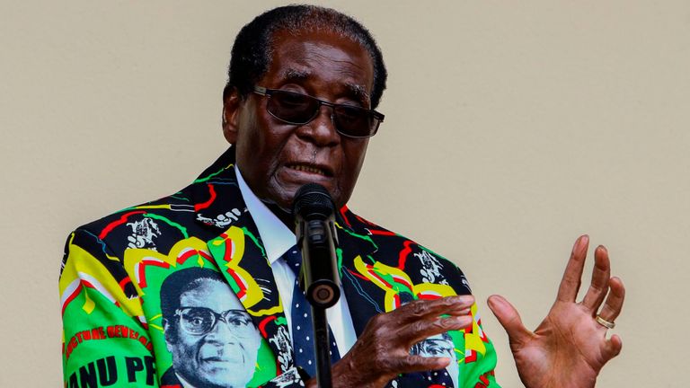 Zimbabwe President Robert Mugabe speaks at the party's annual conference on December 17, 2016 in Masvingo. Zimbabwe's ruling ZANU-PF party's congress endorsed on December 17, 2016 President Robert Mugabe as its candidate for the 2018 election, which could extend his 36 years in office. The leader was endorsed by all party structures at the meeting held in Masvingo, 300 kilometres (186 miles) southeast of the capital Harare. / AFP PHOTO / Jekesai NJIKIZANA (Photo credit should read JEKESAI NJIKIZ