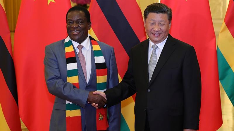 Chinese President Xi Jinping with Zimbabwe's President Emmerson Mnangagwa in 2018 [File: Lintao Zhang/Pool via Reuters]