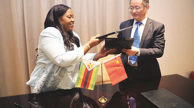 First Lady charms Chinese investors