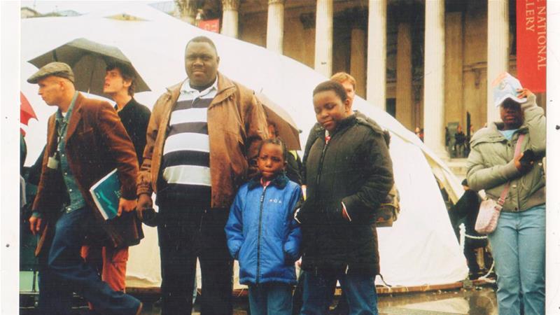 The writer with her sister and father in Trafalgar Square, London, in 2006 [Photo courtesy: Danai Nesta Kupemba]