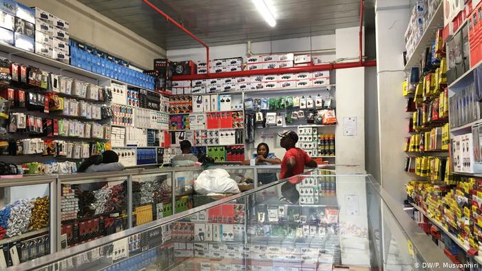 An electronic shop with traders (DW/P. Musvanhiri) An electronic shop with traders (DW/P. Musvanhiri)