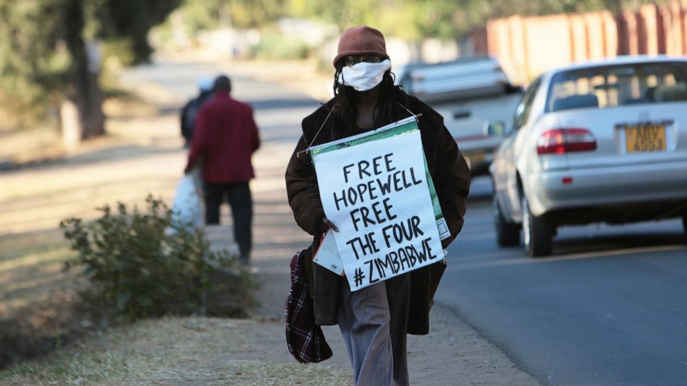 FILE - In this July 22, 2020, file photo, Zimbabwean writer Tsitsi Dangarembga demonstrates for the release of Zimbabwe Journalist Hopewell Chin'ono in Harare. Dangarembga who was arrested during anti-government protests is among six finalists announ