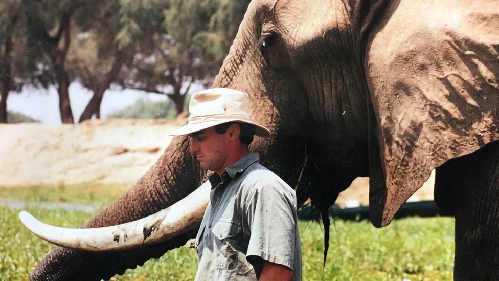 Nick Murray with an elephant when he was younger