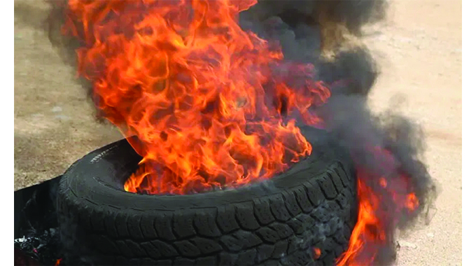 Guard beheaded, body burnt with tyres