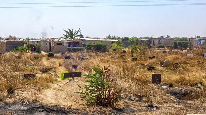 Land barons parcel stands in graveyard