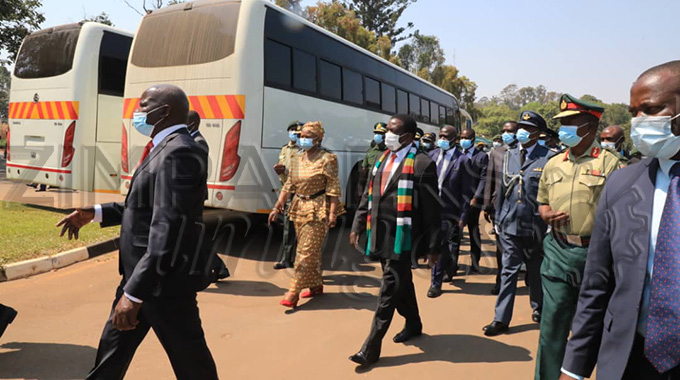 President hands over buses to security sector