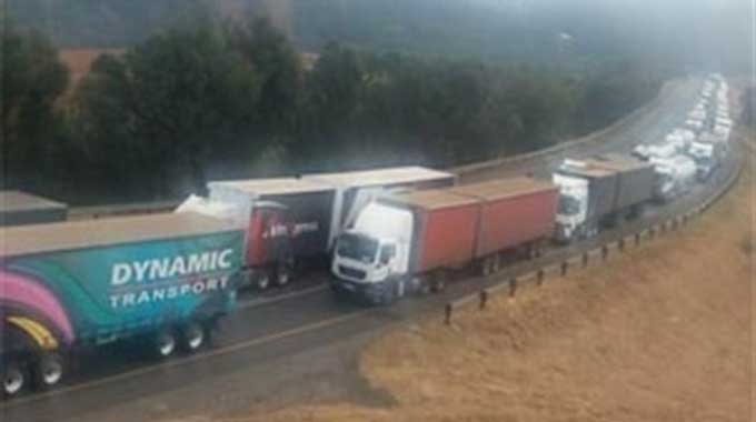 SA truckers block roads in protest over foreigners