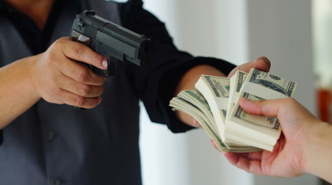 Robbers raid service station, house and school