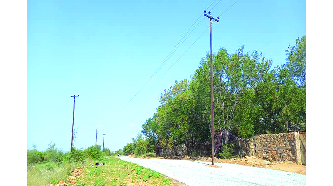 Residents raise alarm over pole in road
