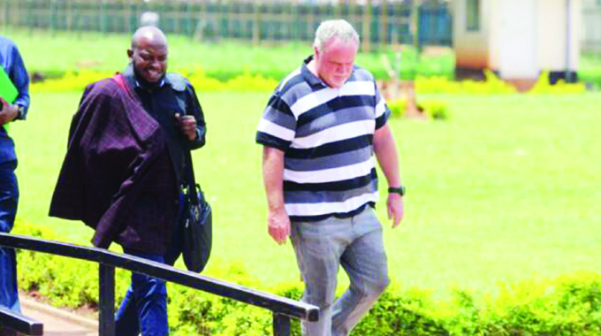 Fraud suspect back in court