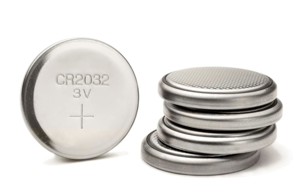 CR2032 lithium button cell.