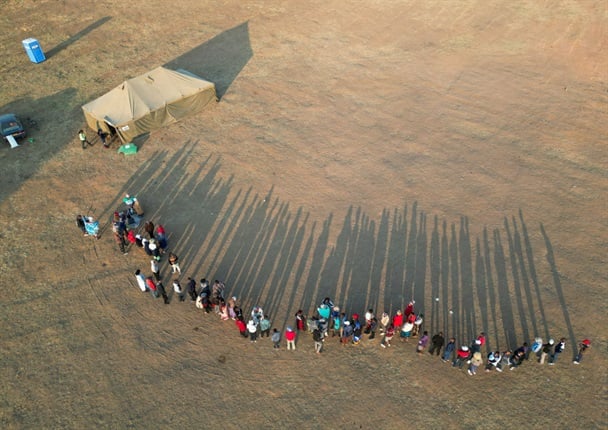 Zimbabwean citizens wait in a queue at a polling station before voting commences in Mabvuku suburb on 23 August 2023 in Harare, Zimbabwe. (Photo: Tafadzwa Ufumeli/Getty Images)
