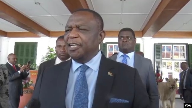 Constantino Chiwenga speaks with reporters at the State House in Harare on Sept. 8, 2023, after being sworn in as one of the two Zimbabwean vice presidents. (Columbus Mavhunga/VOA)