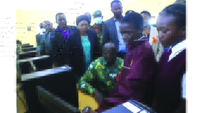 Acting President Mohadi donates laptops, pushes for modern education