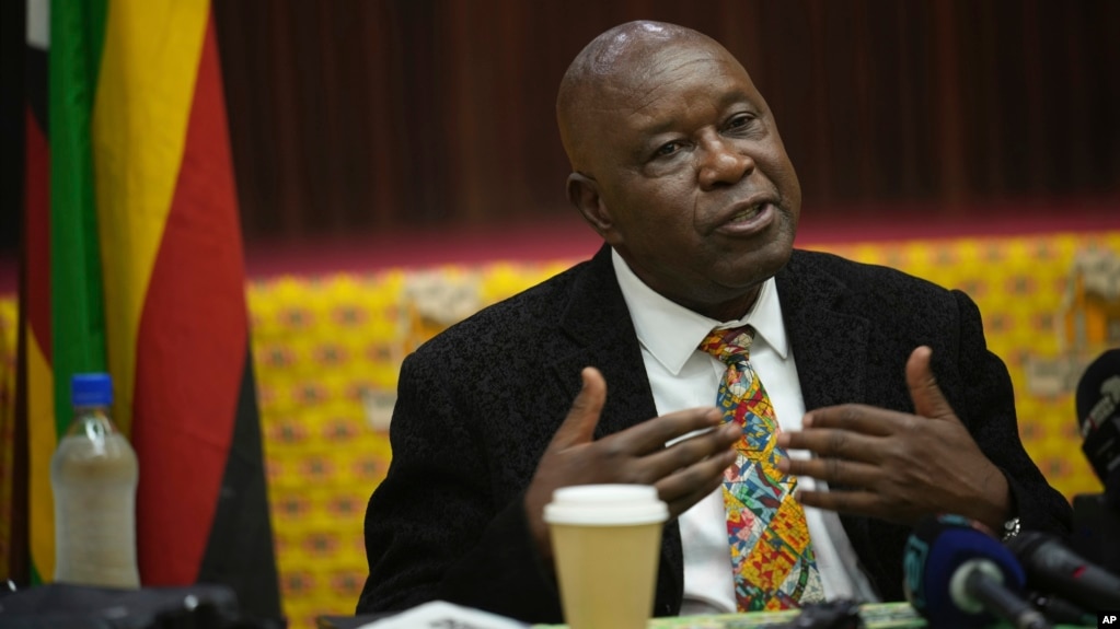 FILE - ZANU-PF spokesperson Christopher Mutsvangwa, shown here at a press conference in Harare, Zimbabwe, on Aug. 27, 2023, raised criticism from opposition parties and human rights groups on Aug. 20, 2024, when he laughed during a briefing about the country detaining activists.