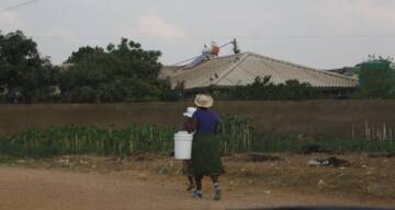 Women from Zengeza suburb in Chitungwiza going to fetch water