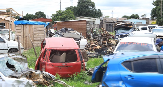 A CITY CHOKING ON ABANDONED VEHICLES